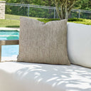 Uttermost Poros Outdoor Pillow – Brown Toned — intricately woven rattan-style blend in Sunbrella acrylic