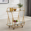 Uttermost Swain Brass Serving Cart – antique brass iron frame with beveled mirrored trays and rolling casters