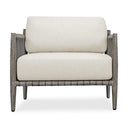 Uttermost Borneo Outdoor Lounge Chair – weathered dark gray mahogany frame with hand-wrapped charcoal gray rope and oyster white cushions