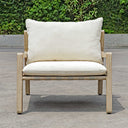 Uttermost Strapped Outdoor Lounge Chair – cerused wheat mahogany frame with taupe back straps and ivory Sunbrella cushions