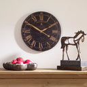 Uttermost Bond Street 18" Wall Clock – Black – weathered black face with gold Roman numerals and hands
