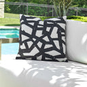 Uttermost Draft Outdoor Pillow – Onyx abstract pattern over cream ground in solution-dyed acrylic
