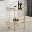 Uttermost Isabelle Gold Bar Cart – soft gold leaf iron frame with two glass trays and locking casters 