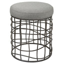 Uttermost Carnival Iron Round Accent Stool – burnished silver asymmetrical iron base with gray polyester upholstered seat