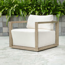 Uttermost Remsen Outdoor Lounge Chair – weathered gray mahogany frame with oyster white Sunbrella cushions