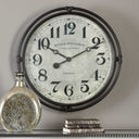 Uttermost Nakul Industrial Wall Clock – Pearl Silver – smoke gray iron frame with aged ivory clock face under glass