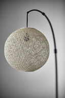 Arched Floor Lamp With Groovy Beige Abstract Wicker Globe Shade - Antiqued Bronze - HomeRoots - Floor Lamps - Elite Enclave Home